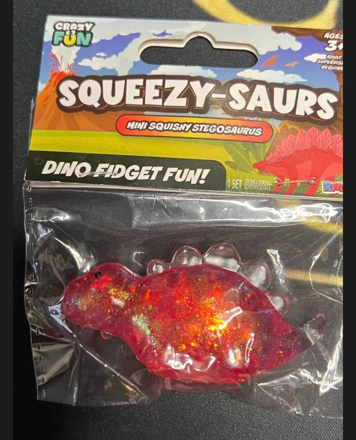 Crazy Fun Squeezy-Saurs Mini Squishy Stegosaurus (Red / Glitter Edition)