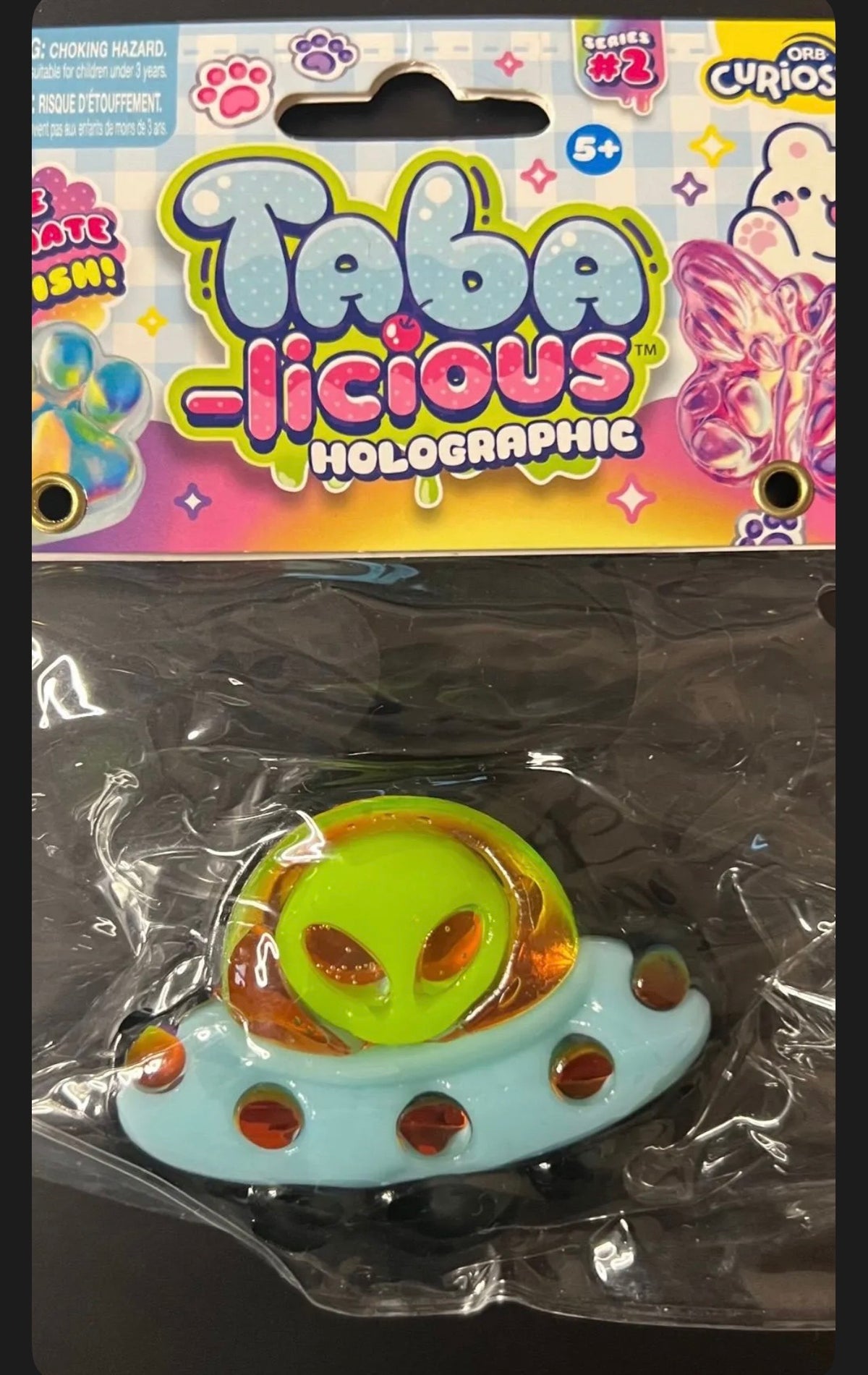 ORB Curiosities Taba-licious Holographic Series 2 — Alien UFO (Black)