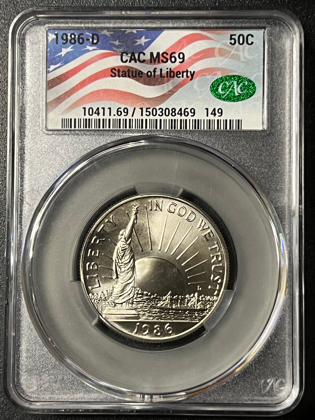 1986-D Statue of Liberty Half Dollar – CAC MS 69 (American Flag Label)