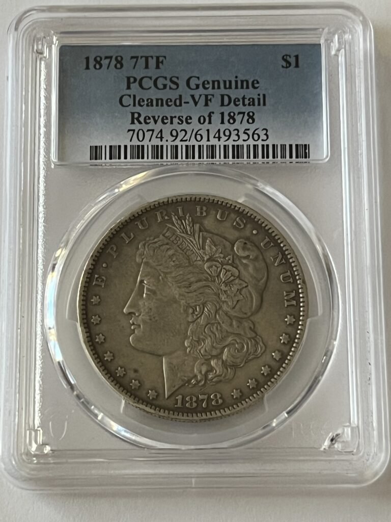1878 Morgan Silver Dollar – 7 Tail Feathers (Reverse of 1878) – PCGS Genuine VF Detail (First-Year Variety!)
