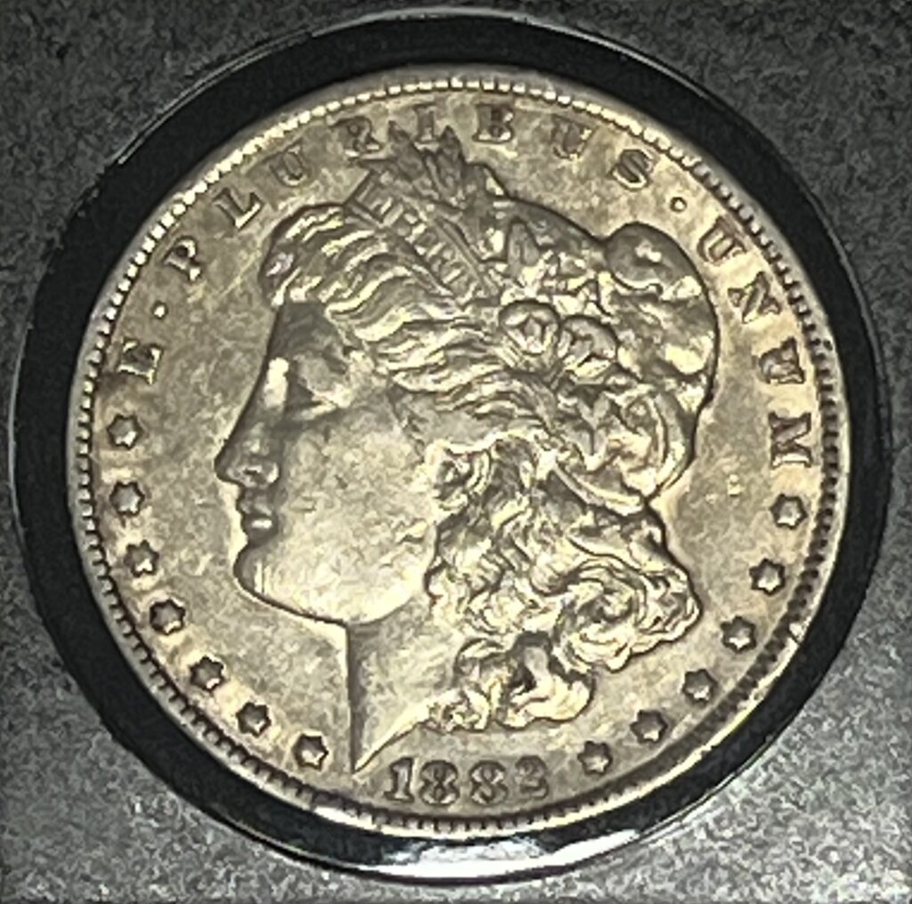 1882‑CC Morgan Silver Dollar (Raw)